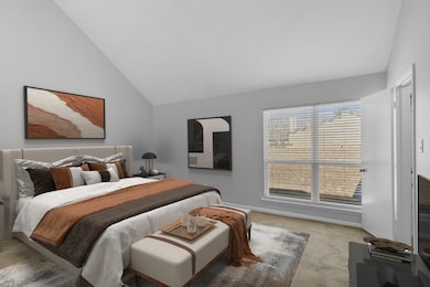 Your spacious primary bedroom offers a peaceful re