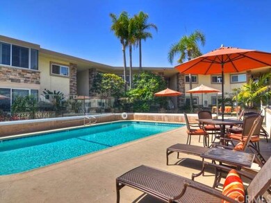 Beautiful glass enclosed community pool with spaci