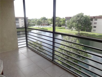 View to the Pool over the Lake from Your Patio