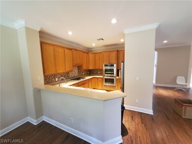 12607 Biscayne Ct, Naples, FL 34105 - photo 2