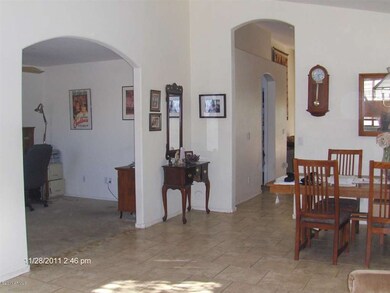 VIEW OF DEN & FORMAL DINING