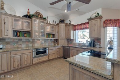 Kitchen - note lighted upper cabinets