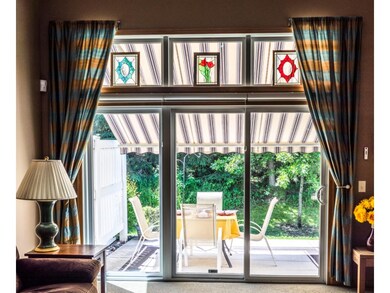 Remote control awning covers the patio for comfort