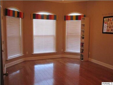 One of the large guest bedrooms has a beautiful ba