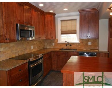 Kitchen. Updated kitchen with island and stainless