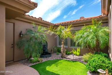 Lush Front Courtyard with Turf