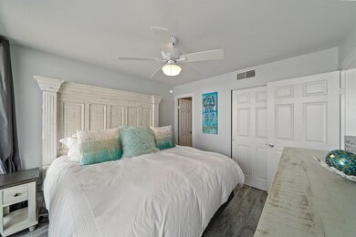 A view of the primary toward the en suite bathroom