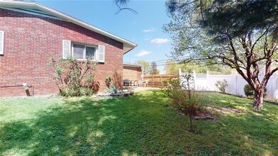 Back side  of Home showing private patio seating a