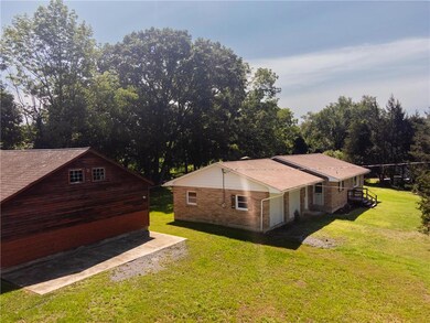 East side of house and studio barn.