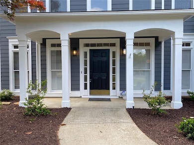 Property entrance featuring a porch