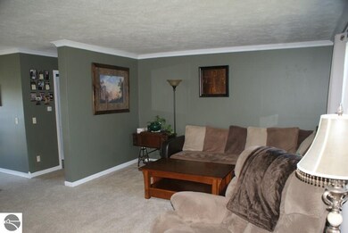 Spacious living room is a great place to welcome f