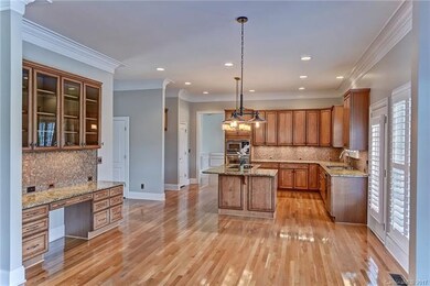 Spacious Kitchen with built in desk.