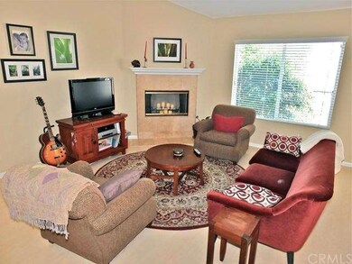 Living room with fireplace on 2nd floor.
