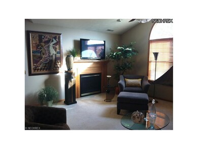 Great room features a gas log fireplace, ceiling f