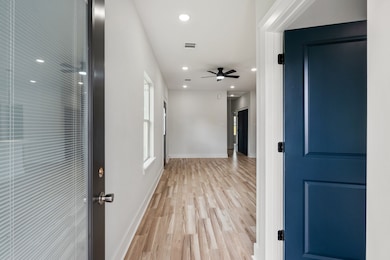 Vinyl flooring that extends throughout the home. N