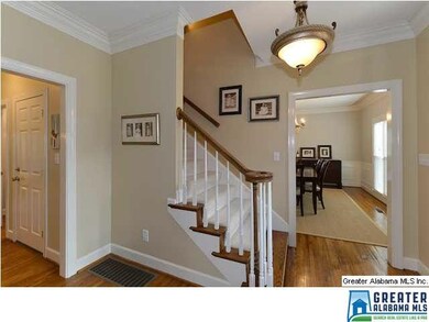 Welcoming entry with hardwoods.