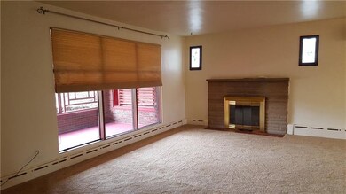 Freshly painted in neutral color, this living room