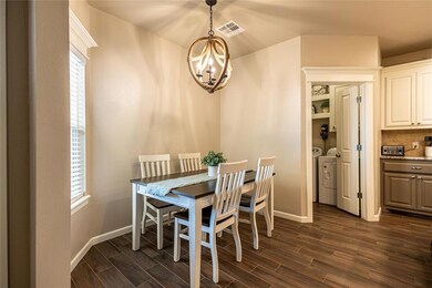 Dining space with independent washer and dryer, pl