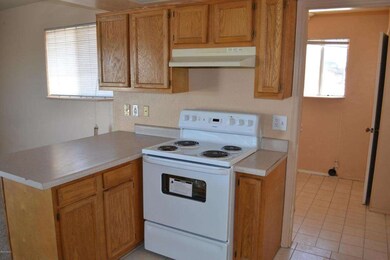 Kitchen with Oak Cabinets and New stove