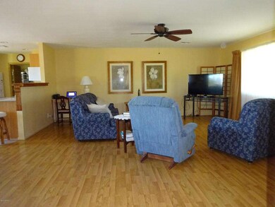 2 LIVING ROOM WITH LAMINATE FLOORS