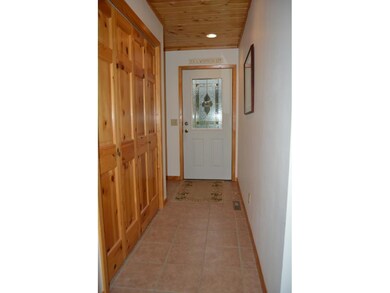 Entry with solid core doors and ceramic floors whi