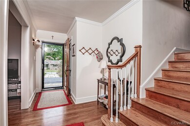 Lovely Light & Bright Foyer with Hardwood Floors