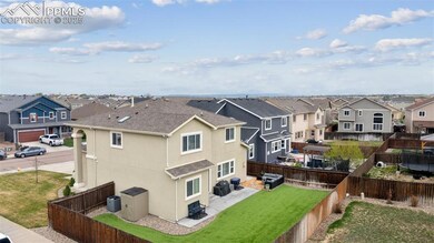Back of property with a lawn, a residential view, 