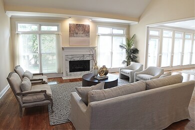 The main living room is spacious and accommodating.  The space is perfect for entertaining or relaxing.