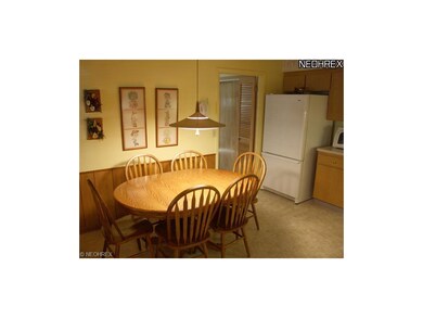 Eat in kitchen.  Door is to foyer.