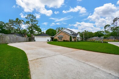 The sweeping driveway allows plenty of parking for family and visitors.