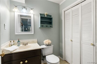 Downstairs half bath & laundry area