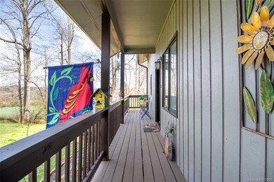 The entry porch, with views that cross fields and fairways.