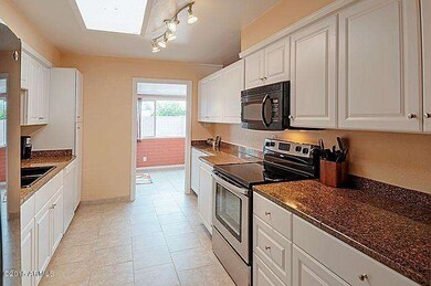 Kitchen has granite counter tops