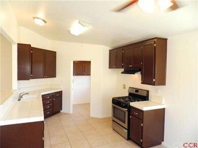 Kitchen opens to livingroom and dinning areas! Lau