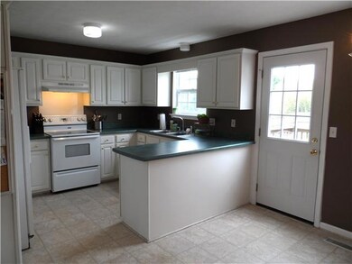 Nice sized kitchen with plenty of cabinets and new vinyl flooring. All appliances can stay.