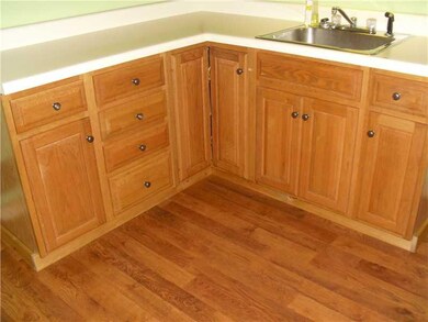 Kitchen. There is a new laminate floor in the kitc