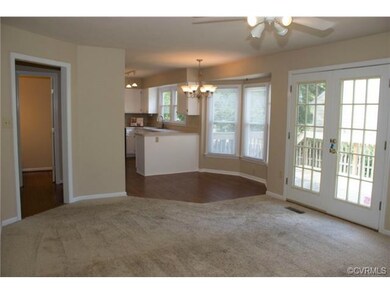 Eat-in Kitchen with bay window is open to the fami