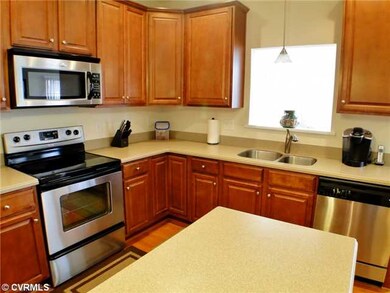 Kitchen - Lovely kitchen with hardwood floors, wal