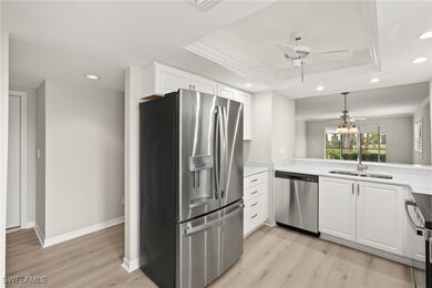 Kitchen with high hats and French Door Refrigerato