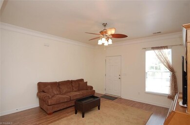 The spacious living room gets plenty of natural light.