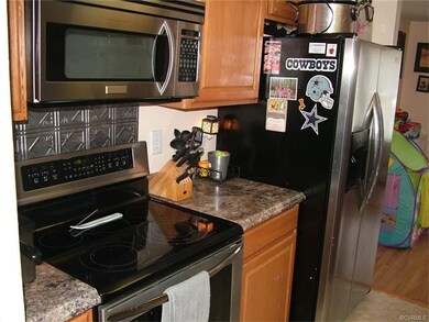 one side of kitchen with stainless appliances