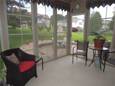 3 Season porch adjoins large stone rear patio