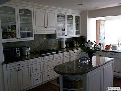 Gourmet kitchen has dumbwaiter to game room