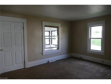 The spacious family room is bright and freshly pai