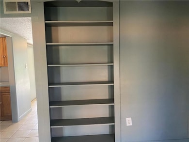 Living room has built in shelves