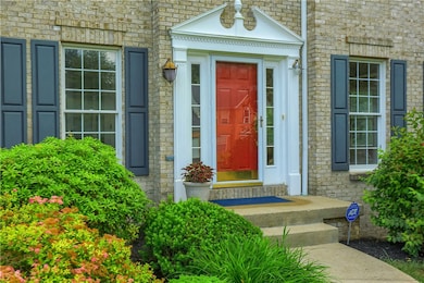 Greet friends and family at the front of this home