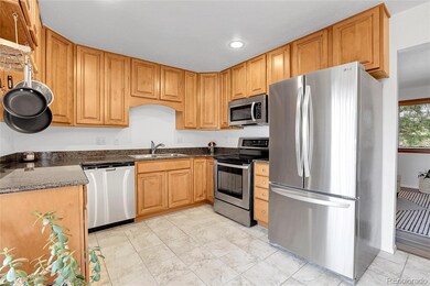Kitchen boasting Granite tops, gorgeous cabinets, and SS appliances!