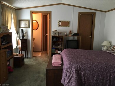 Master bedroom and bath in the back area. Full bat