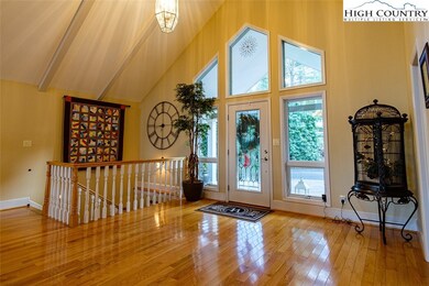 A half bath is located off the inviting foyer.