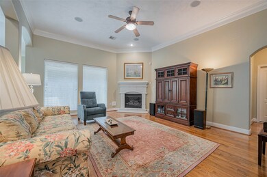 Open family room with high ceilings and gas log fi